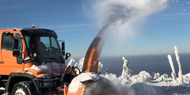 truck plowing snow